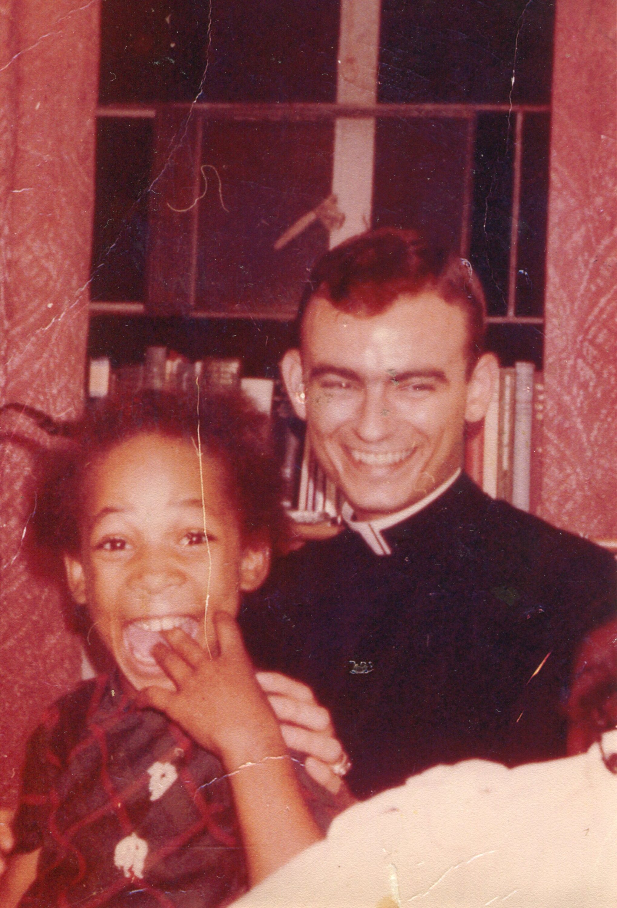 A photo of Sheyann Webb with seminarian and civil rights activist Jonathan Daniels.